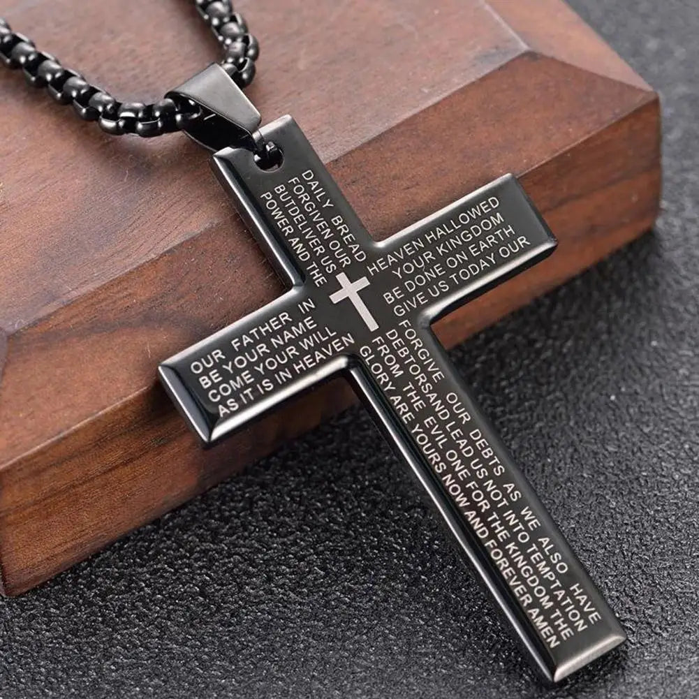 Cross necklace. Engraved with The Lords Prayer.